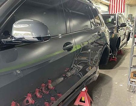 a large truck with a lot of windows  serviced by Brake Pros of Waltham in Framingham specializing in brake caliper painting.